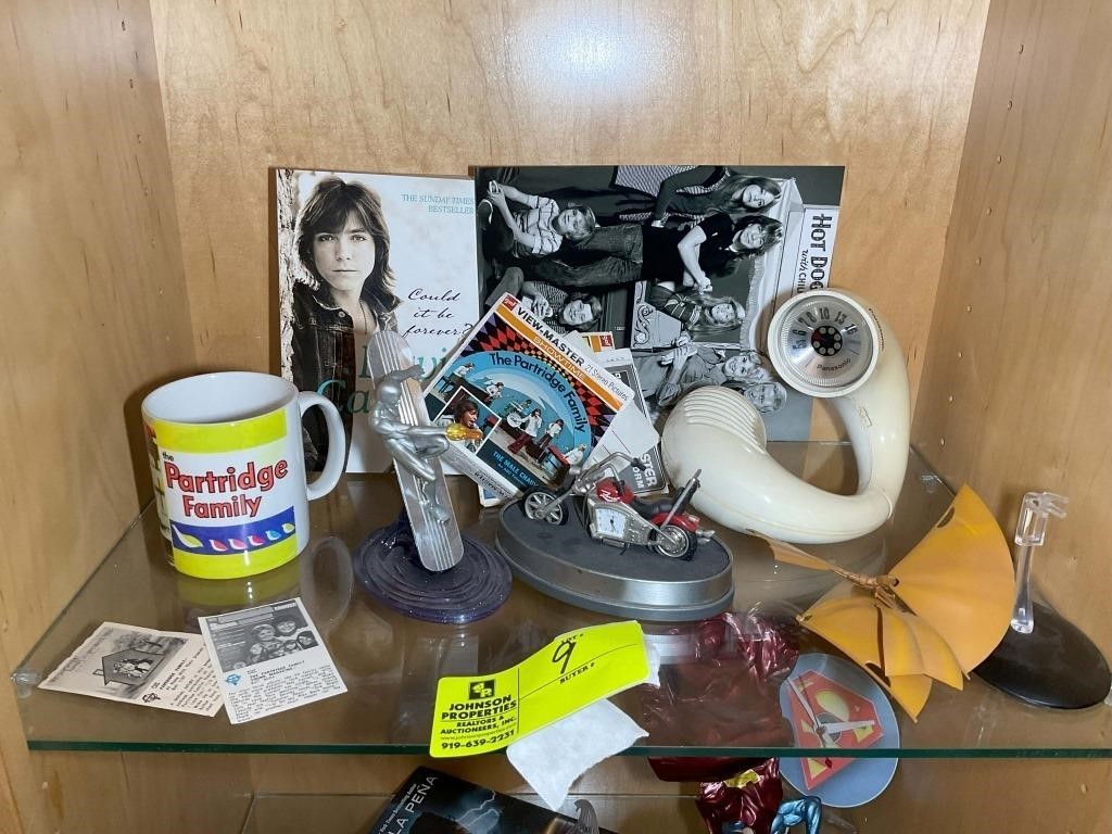 CONTENTS OF SHELF INCLUDING CLOCK MOTORCYCLE, PANA