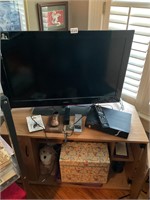 TV, stand and contents