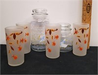 Glass canisters with vintage cups