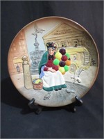 A Royal Doulton Plate:  Old Balloon Seller - D6649