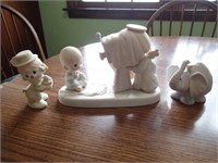 4 Precious Moments Figurines as shown