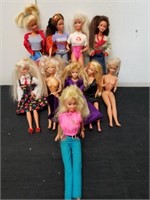 Group of Barbies one Barbie's hair is falling out