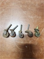 Five Vintage Small Metal Casters