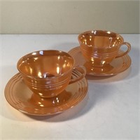 2 PEACH LUSTRE FIREKING TEACUPS & SAUCERS