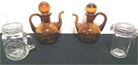 Two 5-in amber glass cruets with stoppers, salt