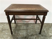 Caned top project bench
