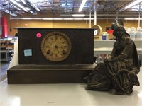 Vintage metal mantle clock and maiden with an