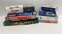 Opened game lot: contents as shown: Monopoly,
