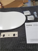 Toto toilet seat, 14.25 wide x 19.25 long