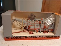 IH thresher in box