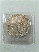1883 o Morgan silver dollar coin