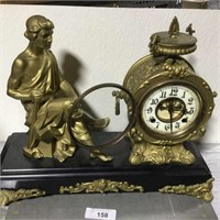 Vintage ornate statue clock