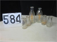 6 Assorted Milk Bottles