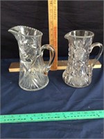 2 clear glass water pitchers (large one is