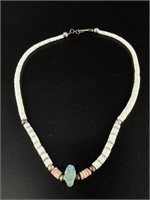 Necklace with Keshi beads made from coral and a tu