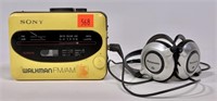 Sony Walkman FM/AM, yellow  Panasonic ear