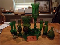 COLLECTION OF GREEN GLASS VASES
