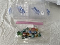 Lot of 21 Marbles and 4 Plastic Storage Containers