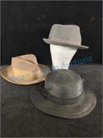 Three hats and mannequin head