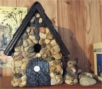 Homemade stone birdhouse. Measures 11" h x 8" w x