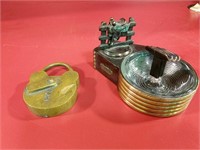 Brass souvenir ashtray and lock paperweight