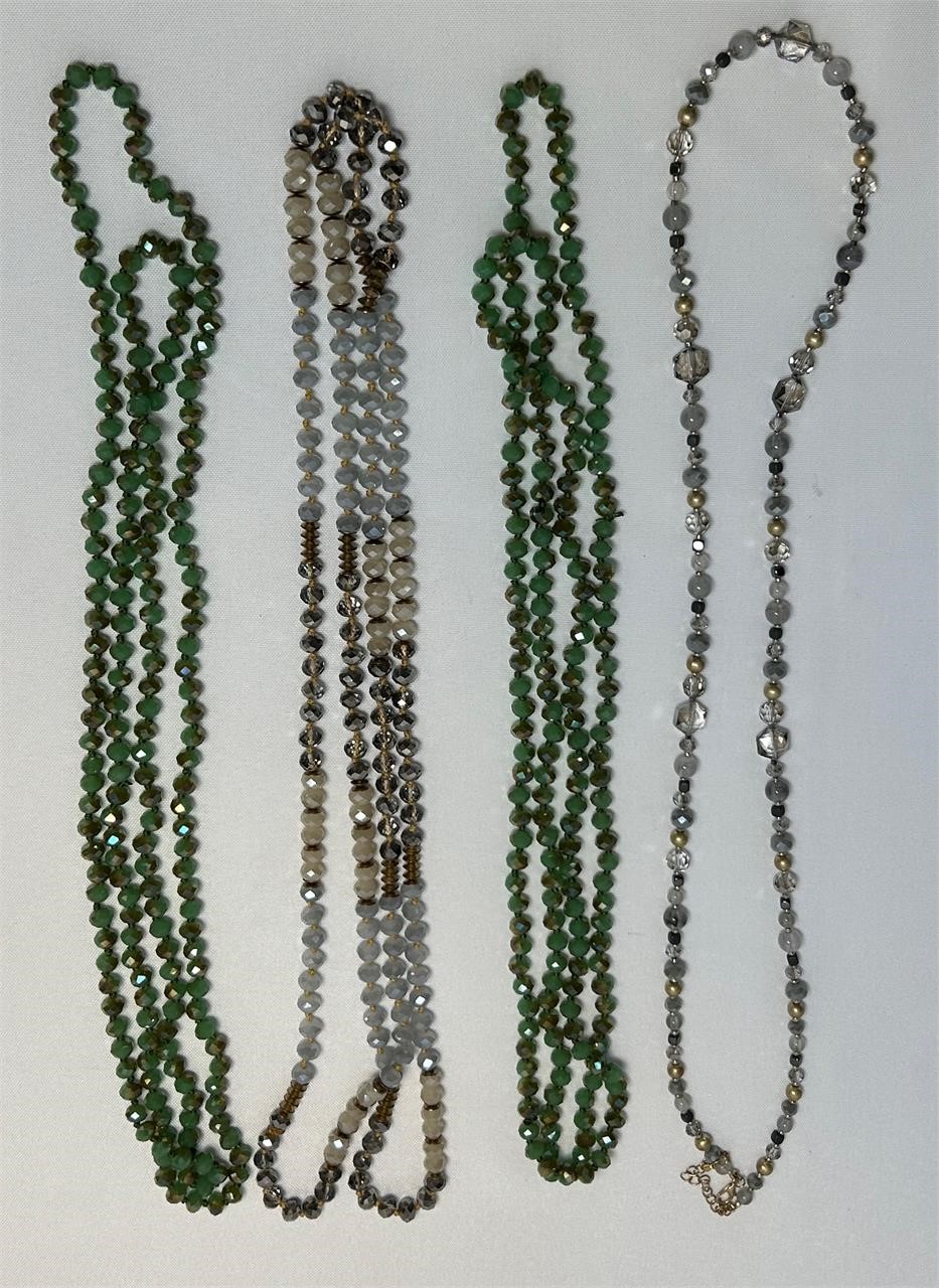 Four Long Beaded Necklaces