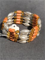 Magnetic bracelet with yellow, orange and white