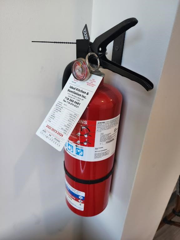 RED FIRE EXTINGUISHERS