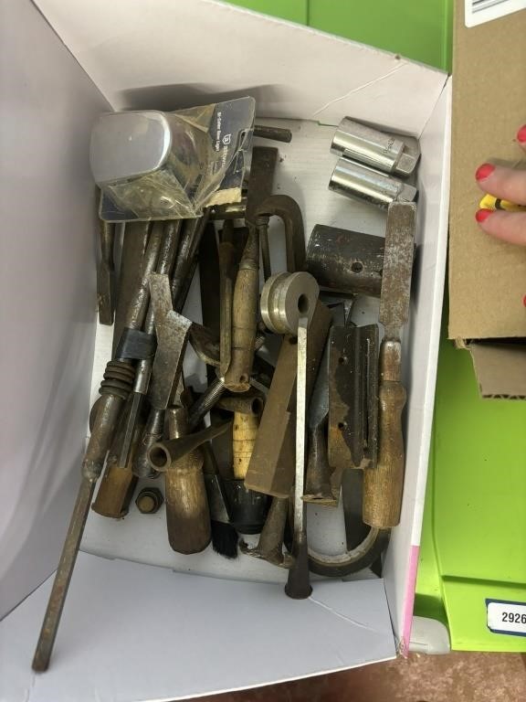 box of tools wrench, file, various other tools
