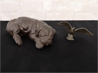 Cast iron sleeping dog and ready to fly duck.