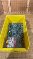 Container of short sheet metal screws