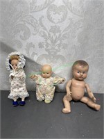 3 small unmarked dolls