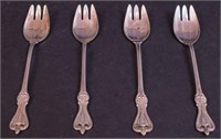 Four sterling silver ice cream forks,