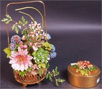 A 11" high metal basket with copper enameled