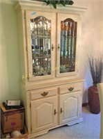 Step back china hutch with beveled glass lighted