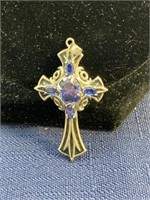 Sterling silver cross pendant with purple stones