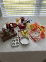 Vintage children's play dishes and cooking items