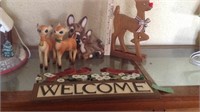 Cardinal welcome sign and deer