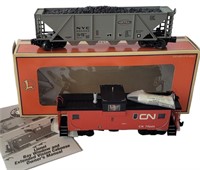 LIONEL CABOOSE AND HOPPER NEW IN BOX
