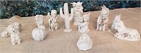 403 - 6 IN WHITE POTTERY FIGURINES