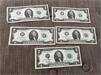 (5) two dollar bills with consecutive serial