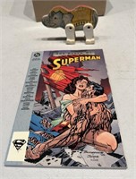 Wooden elephant & The Death of Superman comic