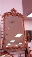 Wall mirror with fancy gesso frame, 27" x 47"
