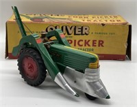 (A) Oliver Corn picker on an Oliver “77” tractor