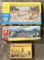 (A) train construction kits including Tyco