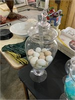 lidded glass jar full of blown eggs 20 inch tall