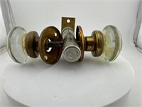 Vintage glass doorknob set.