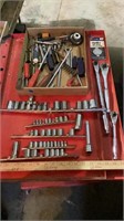 Various size sockets, various socket wrenches,