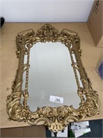 Vintage plastic gold toned mirror