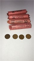 4 rolls of wheat pennies- different years it